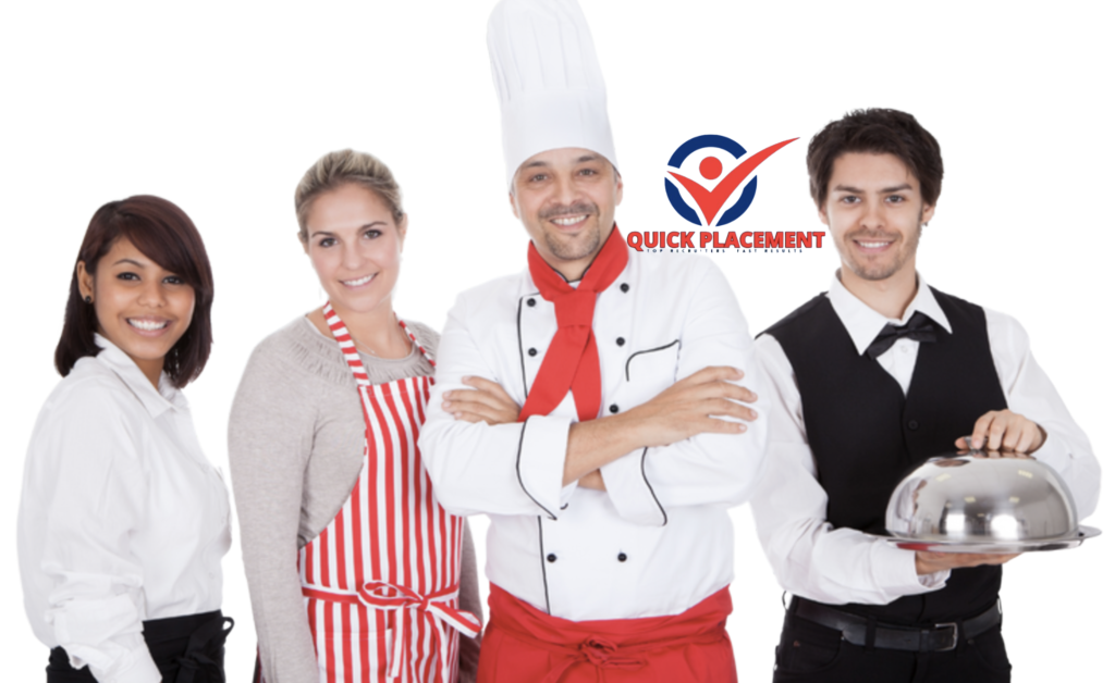 a group of Quick Placement catering... hospitality staff posing for a photo